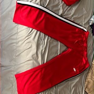 Nike tech pants in red also selling jacket separately
